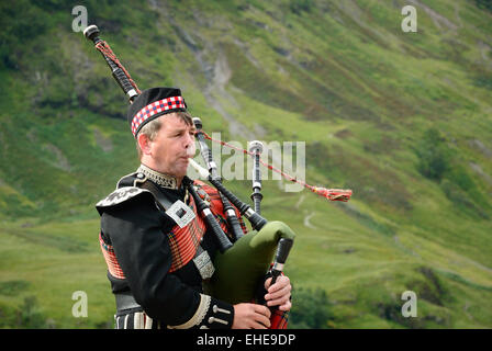 Scottish bagpiper Stock Photo