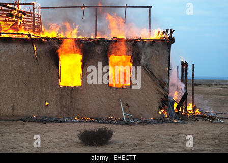 Fire in an abandoned house Stock Photo