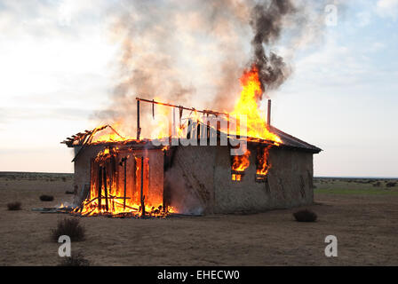 Fire in an abandoned house Stock Photo