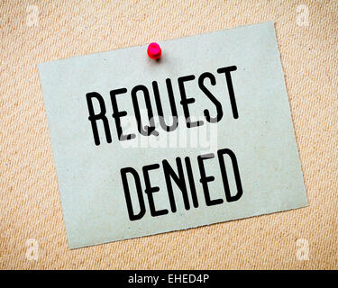 Recycled paper note pinned on cork board. Request Denied Message. Concept Image Stock Photo