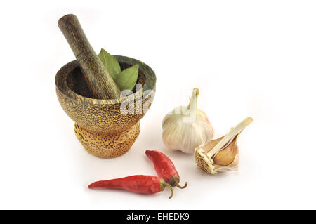 Garlic, chile pepper and mortal Stock Photo