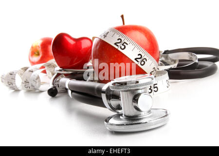 Stethoscope with red apples on a white Stock Photo