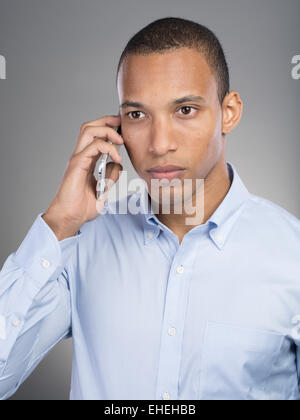 Businessman using Apple iphone Stock Photo