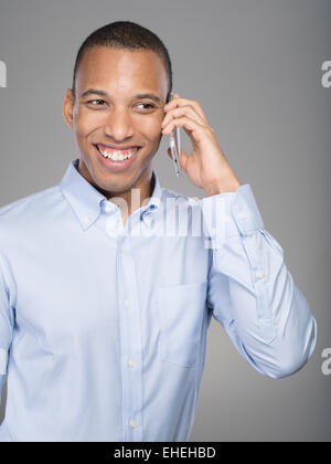 Businessman using Apple iphone Stock Photo