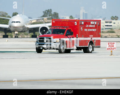 Los Angeles, California, USA. 12th Mar, 2015. The Los Angeles City Fire Department provided back up support for the arrival of President Obama aboard Air Force One at Los Angeles International Airport on Thursday March 12, 2015. An LA City Fire and Paramedic ambulance rig makes its way across the runway at LAX on Thursday afternoon. © David Bro/ZUMA Wire/Alamy Live News Stock Photo