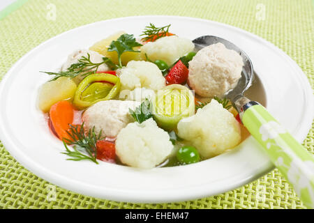 Soup with chicken meatballs and cauliflower Stock Photo