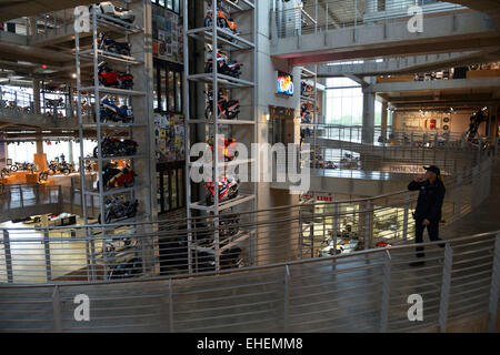 Birmingham, USA. 12th Mar, 2015. A staff walks in Barber Vintage Motorsports Museum in Birmingham, Alabama, the United States, March 12, 2015. With a collection of over 1200 motorcycles, the Barber Vintage Motorsports Museum was named the largest motorcycle museum in the world by the Guinness Book of World Records in 2014. © Yin Bogu/Xinhua/Alamy Live News Stock Photo