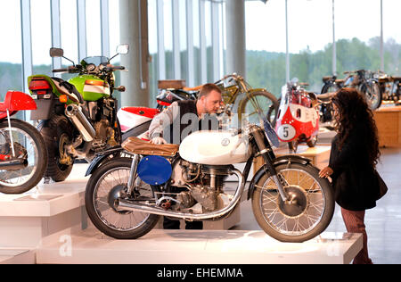 Birmingham, USA. 12th Mar, 2015. Visitors look around in Barber Vintage Motorsports Museum in Birmingham, Alabama, the United States, March 12, 2015. With a collection of over 1200 motorcycles, the Barber Vintage Motorsports Museum was named the largest motorcycle museum in the world by the Guinness Book of World Records in 2014. © Yin Bogu/Xinhua/Alamy Live News Stock Photo