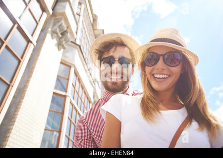 Young couple posing in sunglasses Stock Photo