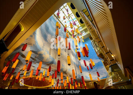Colored lamps hanging from the ceiling Stock Photo