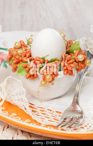 Easter place setting. Easter table setting with egg. Macro, selective focus Stock Photo