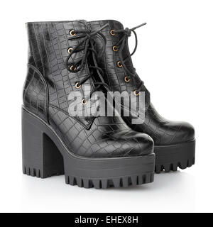 Black high heel crocodile boots for woman Stock Photo