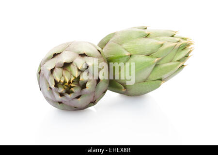 Artichokes isolated on white, clipping path included Stock Photo