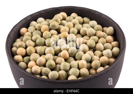 peas in a black plate isolated on white background Stock Photo