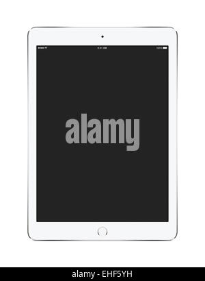 Front view of white tablet computer with blank screen mockup isolated on white background. Stock Photo