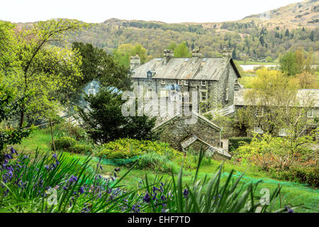 View on Dove Cottage, once the home of the poet William Wordsworth, Grasmere, Lake District Cumbria, England, UK Stock Photo