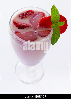 Strawberry Milkshake drink with mint and strawberries on a white background. Stock Photo