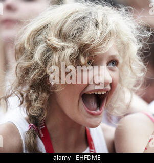 Young girl shouting at Camp Bestival Lulworth Castle Dorset Friday 30th July 2010. Stock Photo