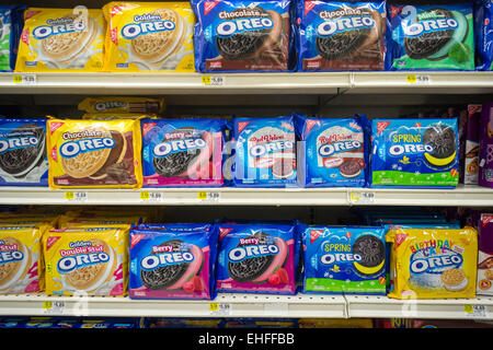 Boxes of Nabisco's Oreo Cookies in multiple yummy flavors on a supermarket shelf in New York on Tuesday, March 9, 2015. The company has upped the ante for cookie lovers by coming out with multiple flavors of the milk and cookie staple. Recent additions include 'Red Velvet' and 'Birthday Cake' with reports of cotton candy and peanut butter coming.  (© Richard B. Levine) Stock Photo