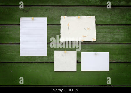 Close up of note papers on wooden background Stock Photo