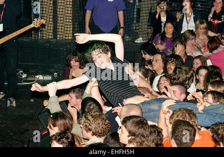 Lead singer from The Others crowd surfing at Club NME at Koko in Camden London. Stock Photo