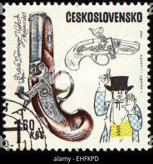 CZECHOSLOVAKIA - CIRCA 1969: stamp printed in Czechoslovakia shows ancient pistol Stock Photo