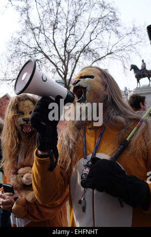 London, UK. 13th Mar, 2015. Campaign to ban canned lion hunting in South Africa held a protest in Trafalgar Square Credit:  Rachel Megawhat/Alamy Live News Stock Photo