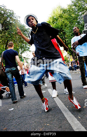 Guy dancing at the Hard-Fi soundsystem at Notting Hill Carnival London. Stock Photo