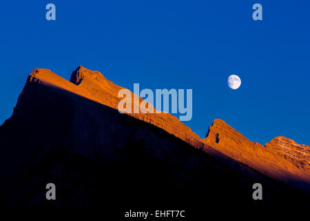Moonrise over Mount Rundle, Banff National Park, Alberta Stock Photo