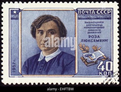 USSR - CIRCA 1957: A stamp printed in USSR shows portrait of Rosa Luxemburg Stock Photo