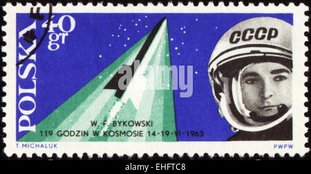 POLAND - CIRCA 1963: A stamp printed in Poland shows russian spaceship Vostok-5 with cosmonaut Valery Bykovsky Stock Photo