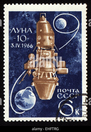 Postage stamp printed in USSR shows soviet spaceship Luna-10