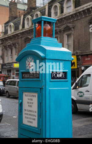 Vintage blue Police phone post or box in central London outside Liverpool Street Railway Station, England - EDITORIAL USE ONLY Stock Photo