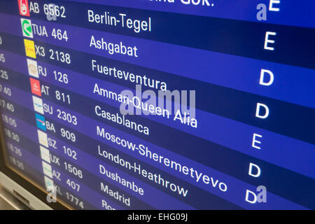 Departure board with destination airports in Frankfurt Main Stock Photo