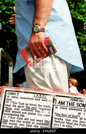 Man holding sign at Speaker's Corner in Hyde Park London. Stock Photo