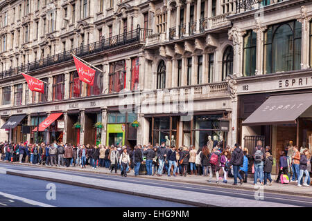 Crowds of shoppers in Regent Street, London, England, on a winter afternoon. Stock Photo