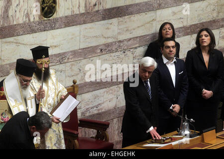 Athens, Greek. 13th Mar, 2015. Newly elected Greek President Prokopis Pavlopoulos(C) takes part in a swearing-in ceremony inside the parliament in Athens, Greek, on March 13, 2015. The new president of the Hellenic Republic, Prokopis Pavlopoulos, was sworn in here on Friday. © Marios Lolos/Xinhua/Alamy Live News Stock Photo