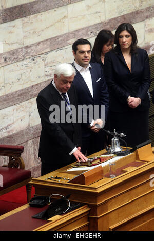 Athens, Greek. 13th Mar, 2015. Newly elected Greek President Prokopis Pavlopoulos(1st L) takes part in a swearing-in ceremony inside the parliament in Athens, Greek, on March 13, 2015. The new president of the Hellenic Republic, Prokopis Pavlopoulos, was sworn in here on Friday. © Marios Lolos/Xinhua/Alamy Live News Stock Photo