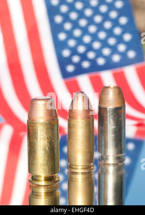 Three bullets on US flag background - concept of homeland defense Stock Photo