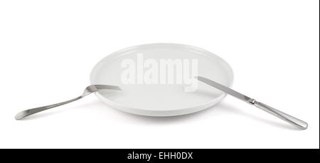 Table knife, fork and ceramic plate isolated Stock Photo