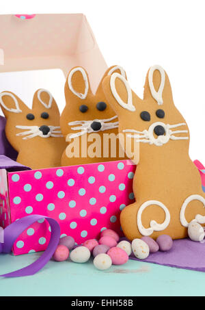 Easter bunny gingerbread cookies in pink and blue polka dot gift box. Stock Photo