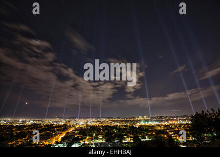 A 26 mile string of spotlights lit up the Los Angeles skyline Friday, March 13, 2015 to commemorate the 30th annivesary of the LA Marathon to be held this Sunday. Stretching from downtown to the beach at Santa Monica, a total of 124 spotlights were used to mark each mile of the route. Los Angeles, California, USA Stock Photo