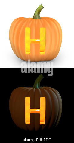 H letter carved on pumpkin jack lantern Stock Photo