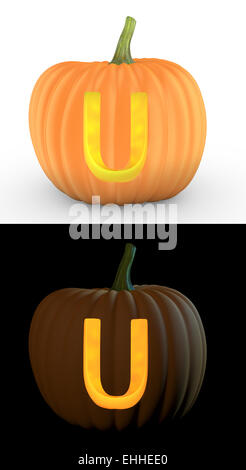 U letter carved on pumpkin jack lantern Stock Photo