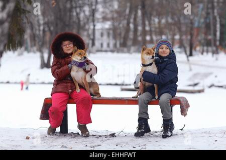 children and dogs concept of friendship loyalty Stock Photo