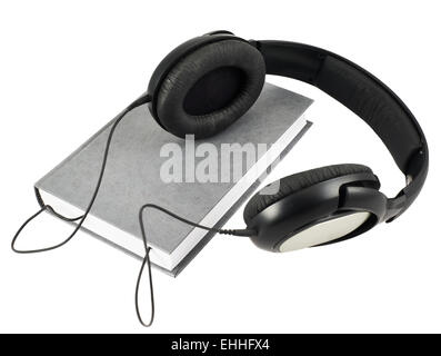 Headphones over a book composition Stock Photo