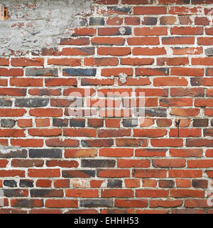 Old red brick wall fragment Stock Photo