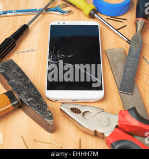 Repair mobile phone composition Stock Photo