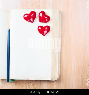 Opened old book composition Stock Photo
