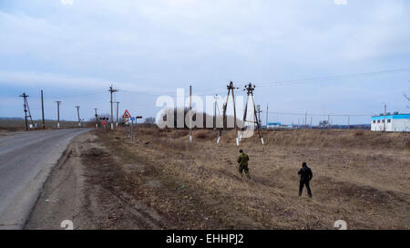 Lugansk, Ukraine. 12th Mar, 2015. Sappers have discovered an improvised explosive device -- Task Force Security Service of Ukraine together with the police on Thursday, March 12, 2015, prevented a terrorist act near the critical infrastructure of the region - road and railway in the Luhansk region. Law enforcers found on the side of the road 'Lisichansk-Artemivs'k' improvised explosive device directed action disguised as a fire extinguisher. Credit:  Igor Golovnov/Alamy Live News Stock Photo